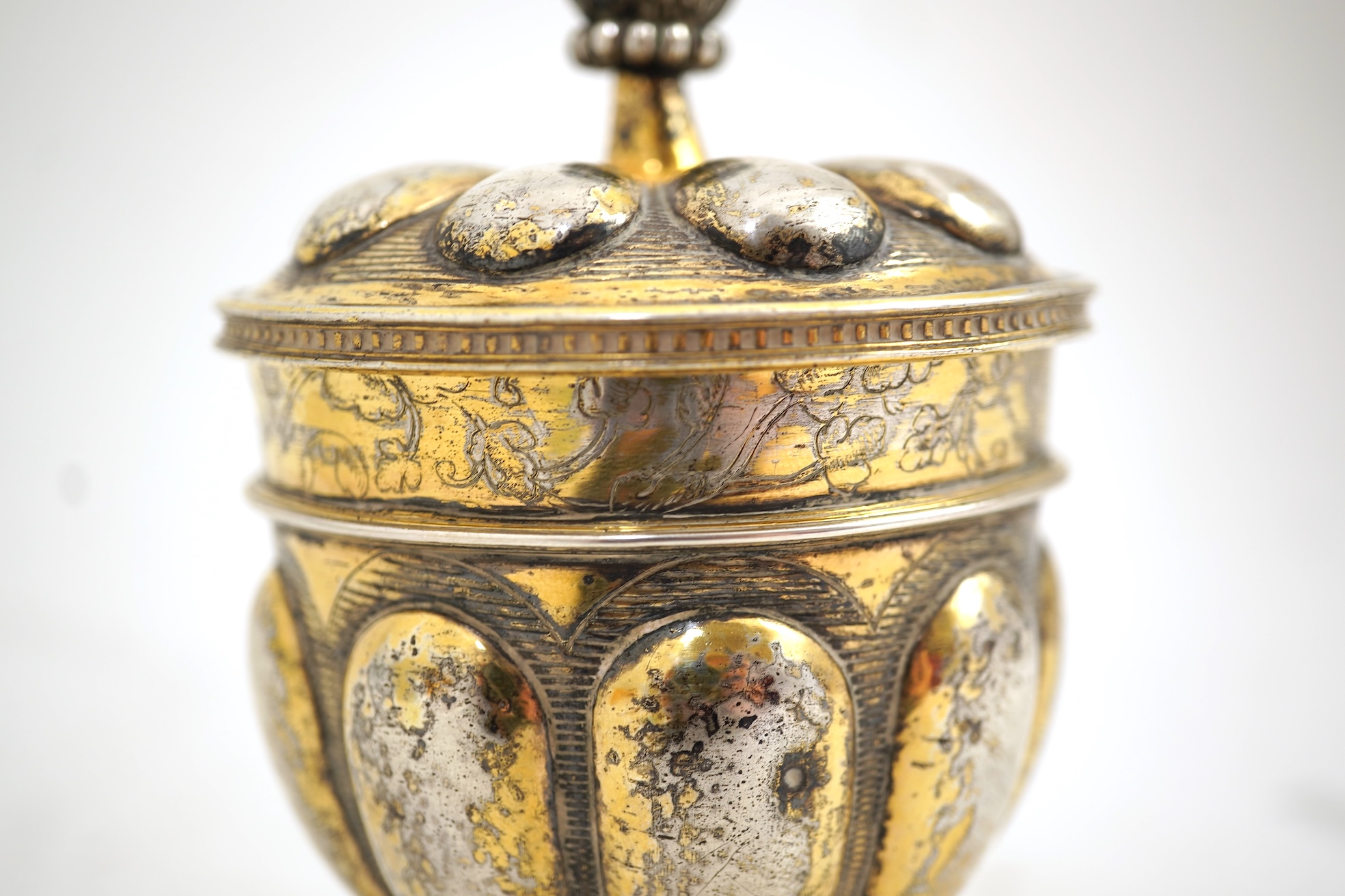A 16th/17th century German silver gilt 'pineapple' cup and cover